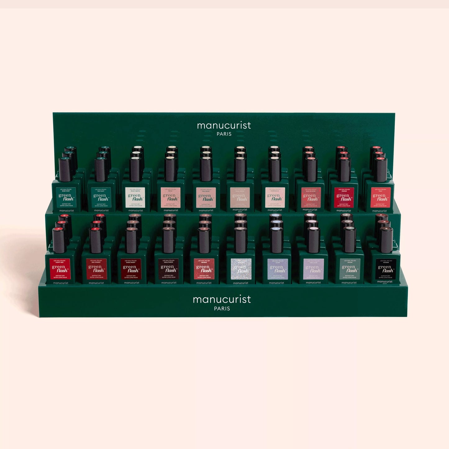 Présentoir Manucurist avec vernis semi-permanents Green Flash en 18 couleurs variées, gamme vegan et bio-sourcée.